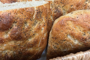 Bread with herbs and salt in a basket